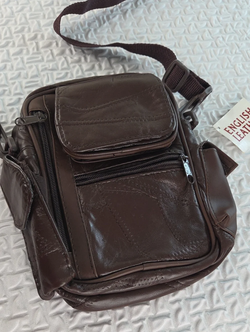 Crossbody MENS SLING BAG.Brown. English Leather PVC. RAIN RESISTANT
